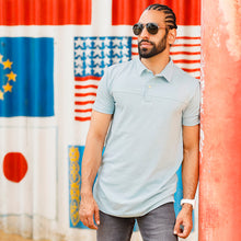 Load image into Gallery viewer, Light Blue Polo shirt
